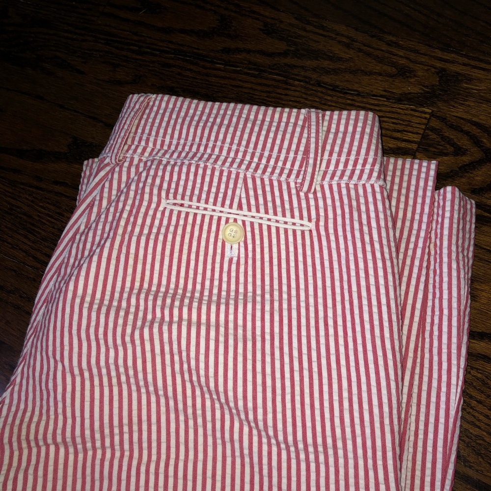 Red and white pinstripe trousers